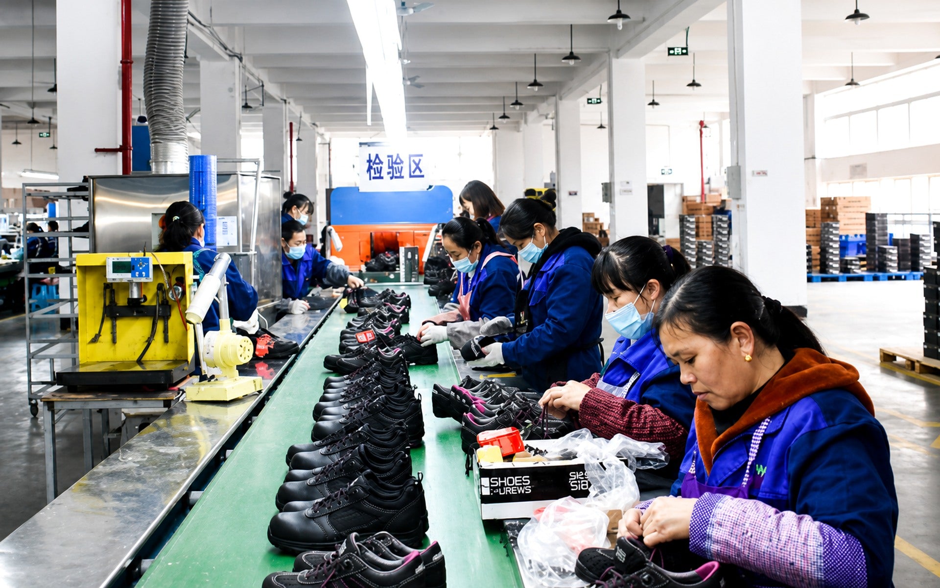 Chinese footwear production team working on the BAMVO partner factory line